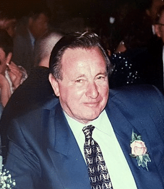 A professional portrait of the company founder, symbolizing over 70 years of construction excellence in the Ottawa region.